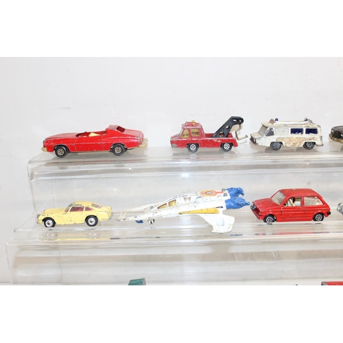 709 - A large qty of assorted vintage Corgi Toys die-cast vehicles, playworn