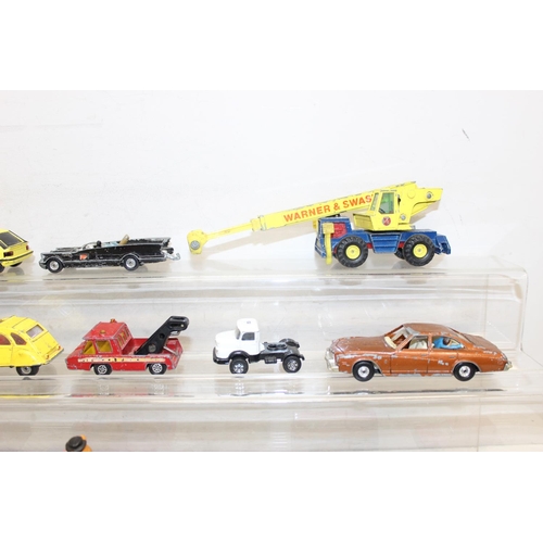 709 - A large qty of assorted vintage Corgi Toys die-cast vehicles, playworn