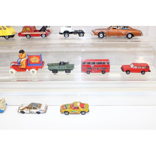 709 - A large qty of assorted vintage Corgi Toys die-cast vehicles, playworn