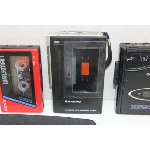 803 - 4 Vintage Walkman's to include Sony WM22, Sanyo M 1001, Sanyo MGR69 and a Sony WM-F2068