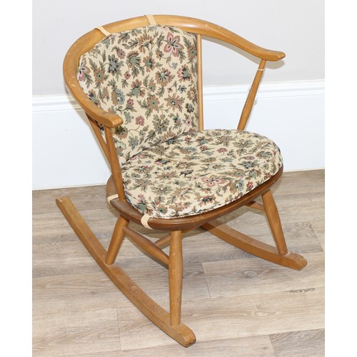 13 - Ercol - a retro low hoop backed rocking armchair with mid-century floral cushions, small child sized... 