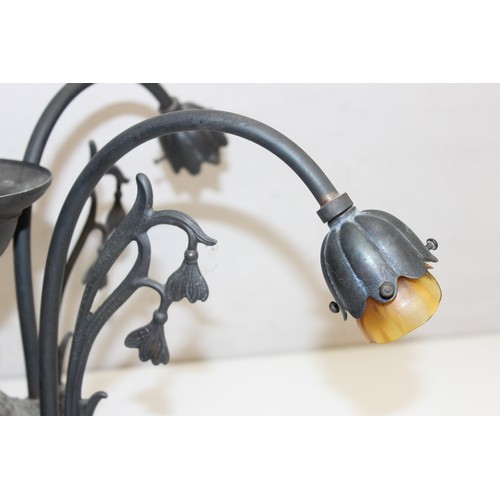 256 - 3 vintage 5-arm metalwork ceiling light fittings, one featuring glass tusk-shaped shades and another... 