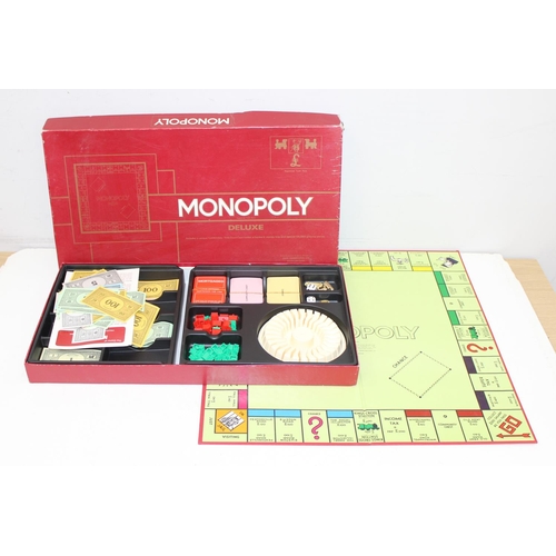 665 - Qty of Monopoly game variations to include 80th Anniversary edition, Deluxe edition, Here and now UK... 