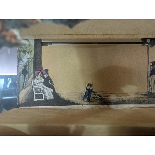 603 - Peep-show: View of the Mall in St. James's Park 1829, a rare concertina paper toy, dated 1829 but wi... 