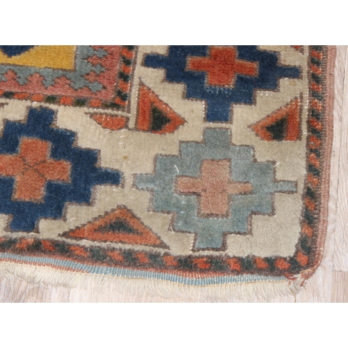 200 - A vintage multi-coloured Turkish made hand knotted rug, approx 147cm x 110cm