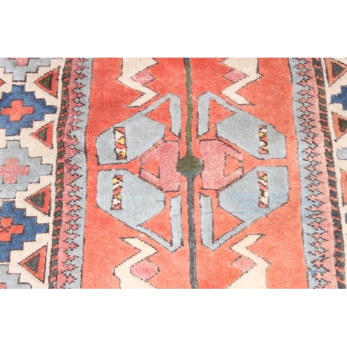 200 - A vintage multi-coloured Turkish made hand knotted rug, approx 147cm x 110cm