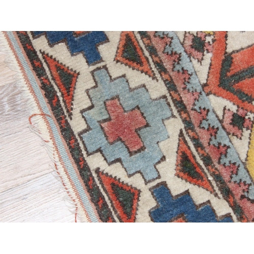 200 - A vintage multi-coloured Turkish made hand knotted rug, approx 147cm x 110cm