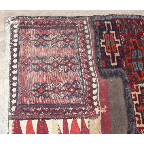 204 - A very unusual vintage patchwork rug made from various rug parts to inc Kilim believed to be Bakhtia... 