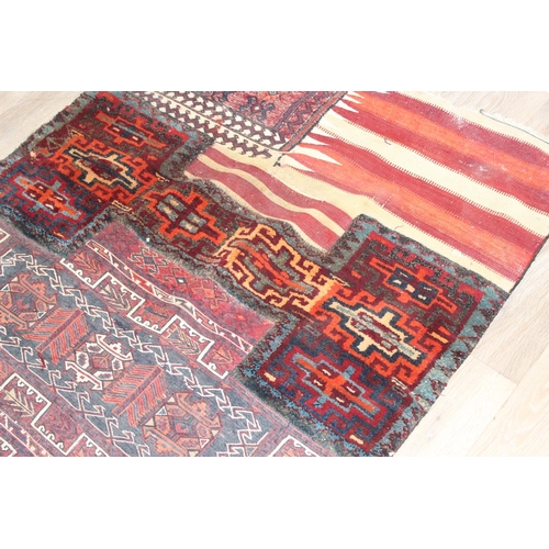 204 - A very unusual vintage patchwork rug made from various rug parts to inc Kilim believed to be Bakhtia... 