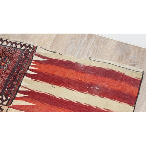 204 - A very unusual vintage patchwork rug made from various rug parts to inc Kilim believed to be Bakhtia... 