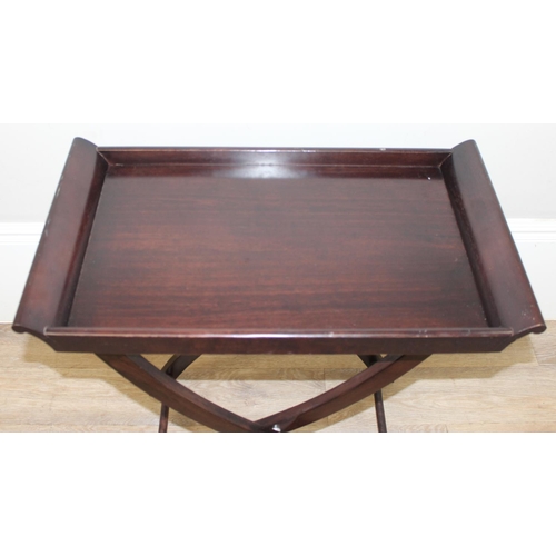 139 - An antique style mahogany butler's tray table on folding stand, 20th century, approx 68cm wide x 38c... 