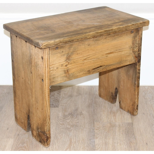 69 - 2 rustic vintage pine stools, the largest approx 48cm wide x 28cm deep x 40cm tall