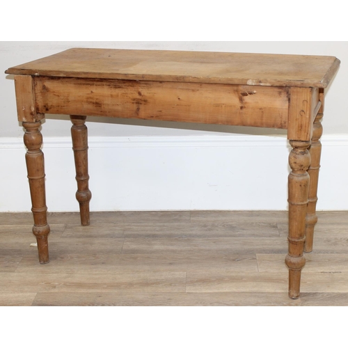 118 - A Victorian pine hall table or desk with turned legs, approx 113cm wide x 51cm deep x 75cm tall