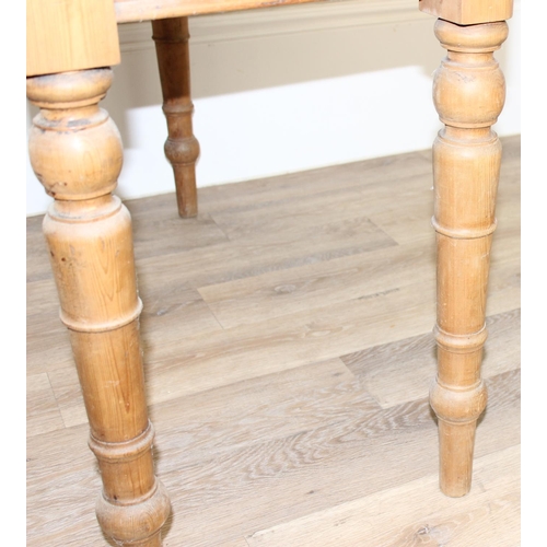 118 - A Victorian pine hall table or desk with turned legs, approx 113cm wide x 51cm deep x 75cm tall