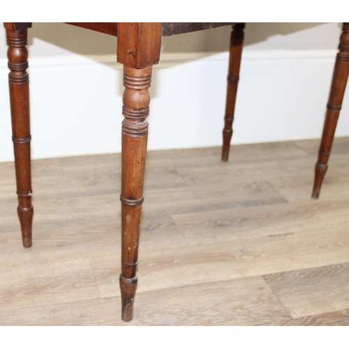 117 - A Victorian mahogany 2 drawer side table or hall table with turned legs and bun handles, approx 94cm... 