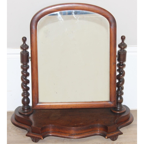 140 - A Victorian mahogany table top mirror with barley-twist supports, approx 62cm wide x 61cm tall