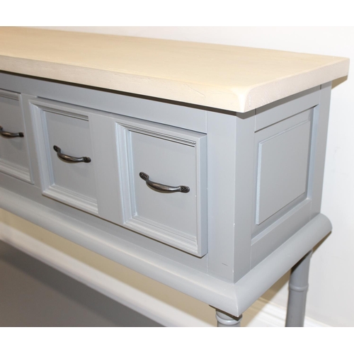 26 - A modern grey painted hall table or sideboard with 3 drawers, formed as 6 drawers with iron handles,... 