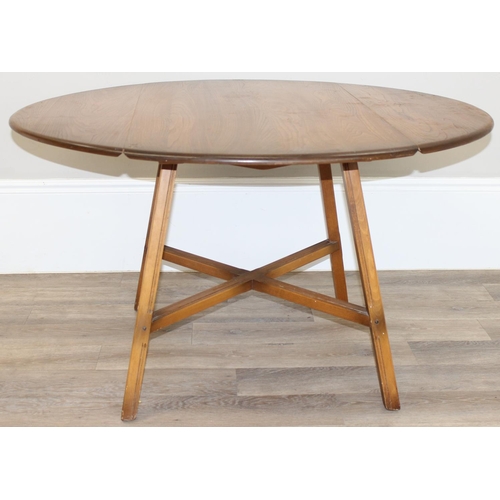 124 - Ercol elm topped drop leaf dining table with oval top, Golden Dawn finish, gold label, approx 113cm ... 