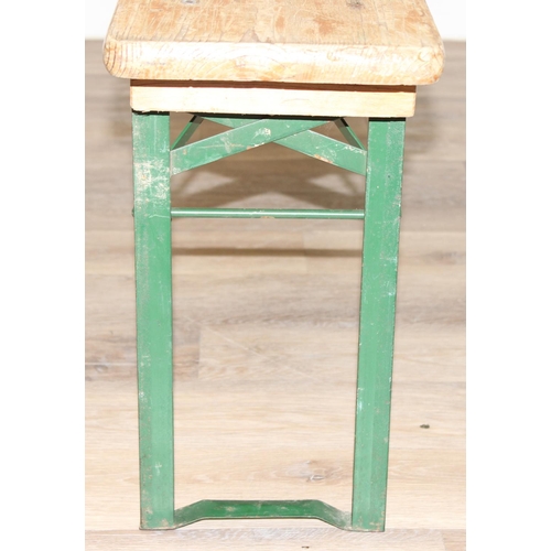 61 - A vintage wooden topped bench with folding metal legs, previously from Carter's Steam Fair, approx 1... 