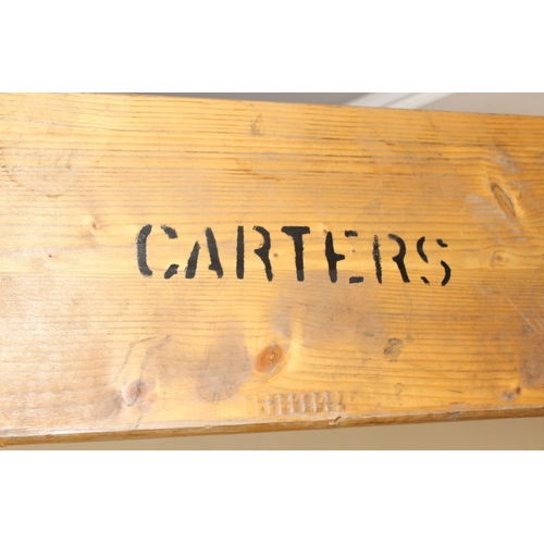 61 - A vintage wooden topped bench with folding metal legs, previously from Carter's Steam Fair, approx 1... 