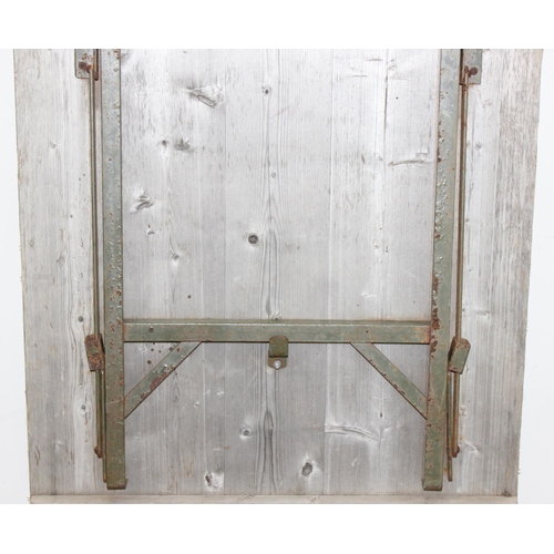 108 - A vintage weathered pine trestle table with folding metal legs, mid-late 20th century, approx 178cm ... 