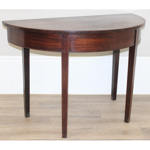 126 - A Georgian mahogany demi-lune side table with square tapered legs, approx 107cm wide x 54cm deep x 7... 