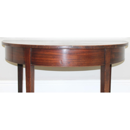 126 - A Georgian mahogany demi-lune side table with square tapered legs, approx 107cm wide x 54cm deep x 7... 