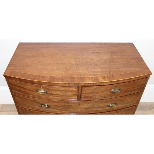 135 - A Victorian mahogany 2 over 3 bow fronted chest of drawers with brass Hepplewhite style handles and ... 