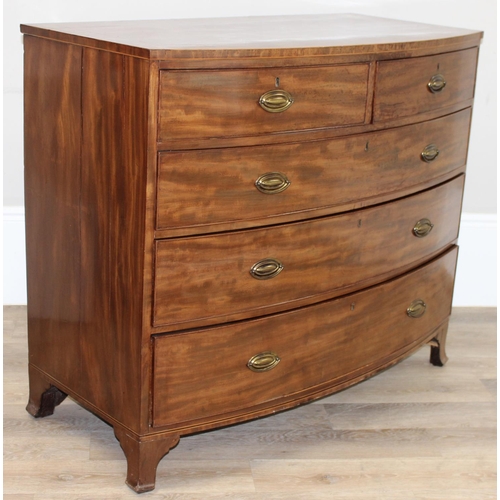 135 - A Victorian mahogany 2 over 3 bow fronted chest of drawers with brass Hepplewhite style handles and ... 