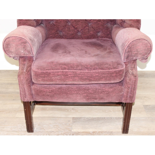 116 - A Georgian style wingback armchair with burgundy coloured button upholstery, approx 83cm wide x 115c... 