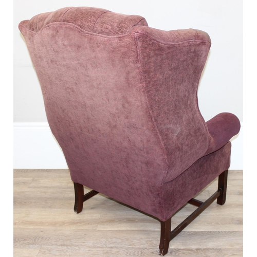 116 - A Georgian style wingback armchair with burgundy coloured button upholstery, approx 83cm wide x 115c... 