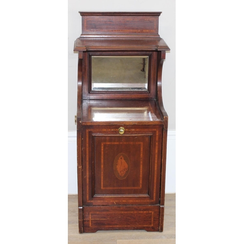 66 - An Edwardian mahogany Sheraton revival low cabinet with drop down front and mirror back and brass ha... 