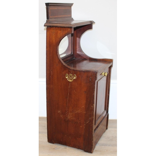 66 - An Edwardian mahogany Sheraton revival low cabinet with drop down front and mirror back and brass ha... 