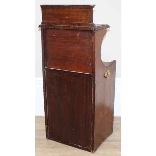 66 - An Edwardian mahogany Sheraton revival low cabinet with drop down front and mirror back and brass ha... 