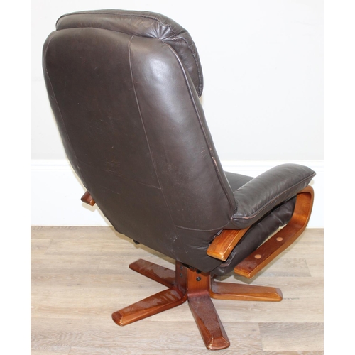 3 - An Ekornes style retro brown leather reclining armchair with wooden base by Global Furniture Allianc... 