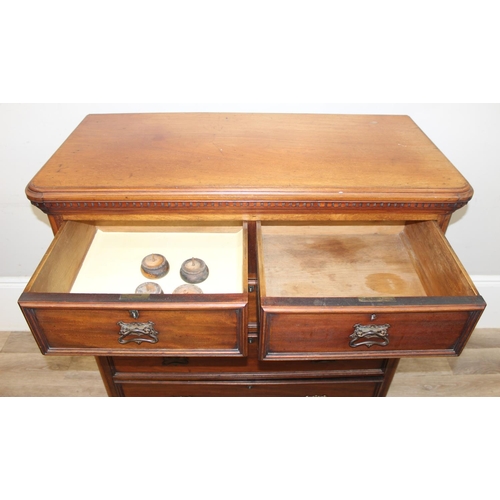 138 - An antique mahogany 2 over 3 chest of drawers with Art Nouveau brass handles, approx 116cm wide x 54... 