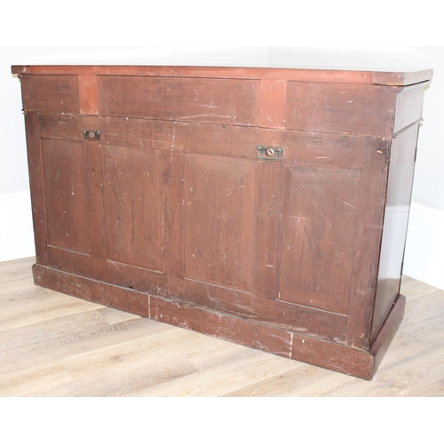 35 - A Victorian mahogany breakfront sideboard, 2 side cupboards flanking a central cupboard, one of the ... 