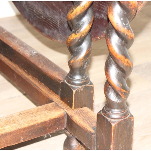 127 - An early 20th century oak drop leaf table with barley-twist legs, approx 107cm wide x 49cm deep (ext... 