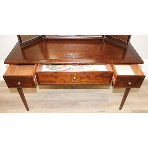 130 - A retro Stag dressing table and stool, the table with 3 mirrors, approx 120cm wide x 47cm deep x 127... 