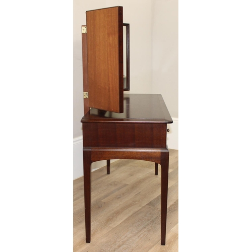 130 - A retro Stag dressing table and stool, the table with 3 mirrors, approx 120cm wide x 47cm deep x 127... 