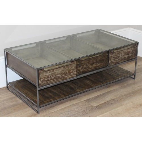 49 - An unusual industrial style reclaimed wooden, metal and glass bijouterie coffee table, the 3 drawers... 