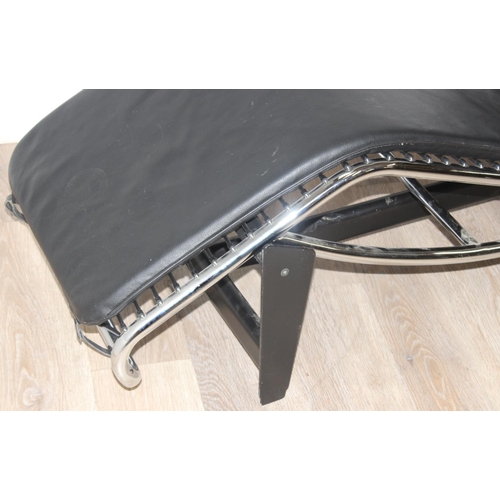 8 - In the manner of Le Corbusier, a retro LC4 style chaises longue chair or lounger made from black lea... 