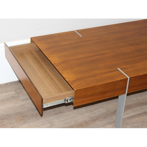 54 - A retro coffee table with figured wooden top and unusual inset metal legs, each end with 2 drawers, ... 