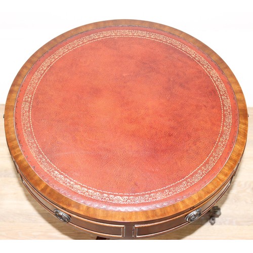 92 - An antique style mahogany drum table with 3 drawers and 3 faux drawers, red gilt tooled inset leathe... 