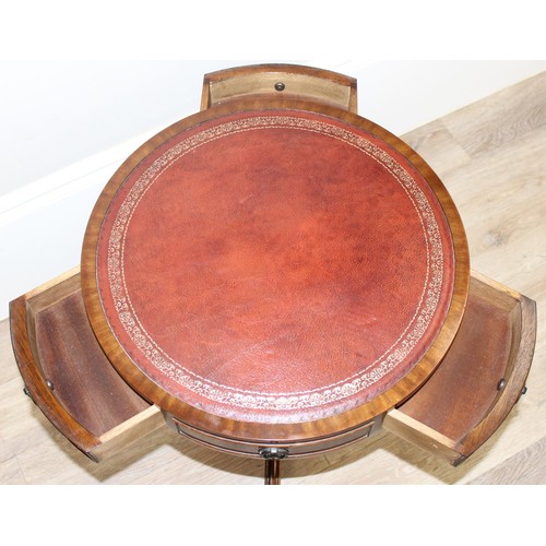 92 - An antique style mahogany drum table with 3 drawers and 3 faux drawers, red gilt tooled inset leathe... 