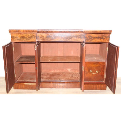 35 - A Victorian mahogany breakfront sideboard, 2 side cupboards flanking a central cupboard, one of the ... 