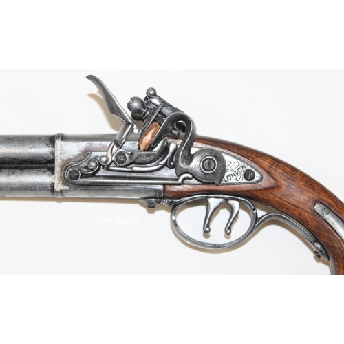 1404 - Replica weapons: Double-barelled London flintlock pistol, French long flintlock pistol and a Hadley ... 