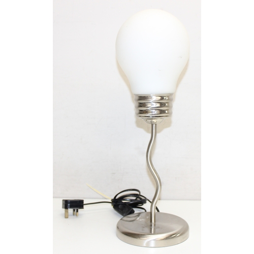 230 - 2 lightbulb designed lamps, one a table lamp with chromed base and a pendant light, the pendant ligh... 