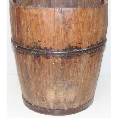 270 - A vintage wooden and wrought iron bucket, approx 60cm tall