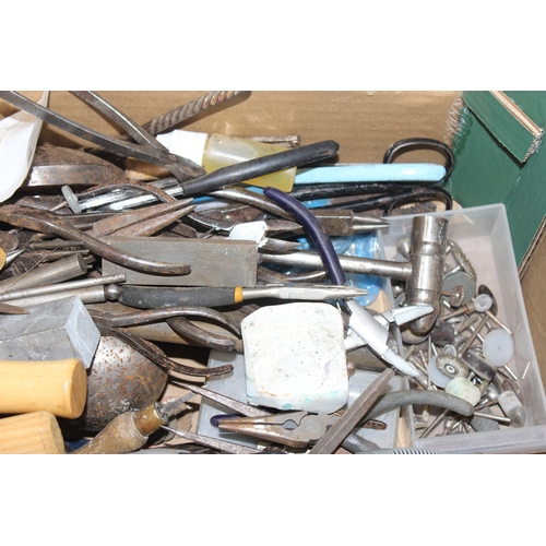 700 - A large qty of assorted tools, mainly jewellery making tools to inc hammers, punches etc